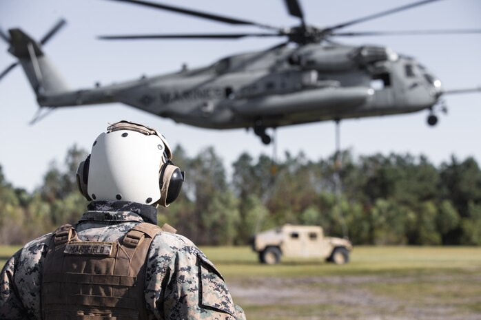 U.S. Marine observes a helicopter during helicopter support team training at Camp Lejeune, North Carolina, May 11, 2020.