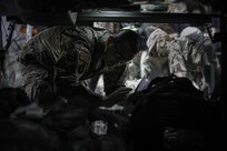 Urban Augmented Medical Task Force 452-1 loads bags to travel home