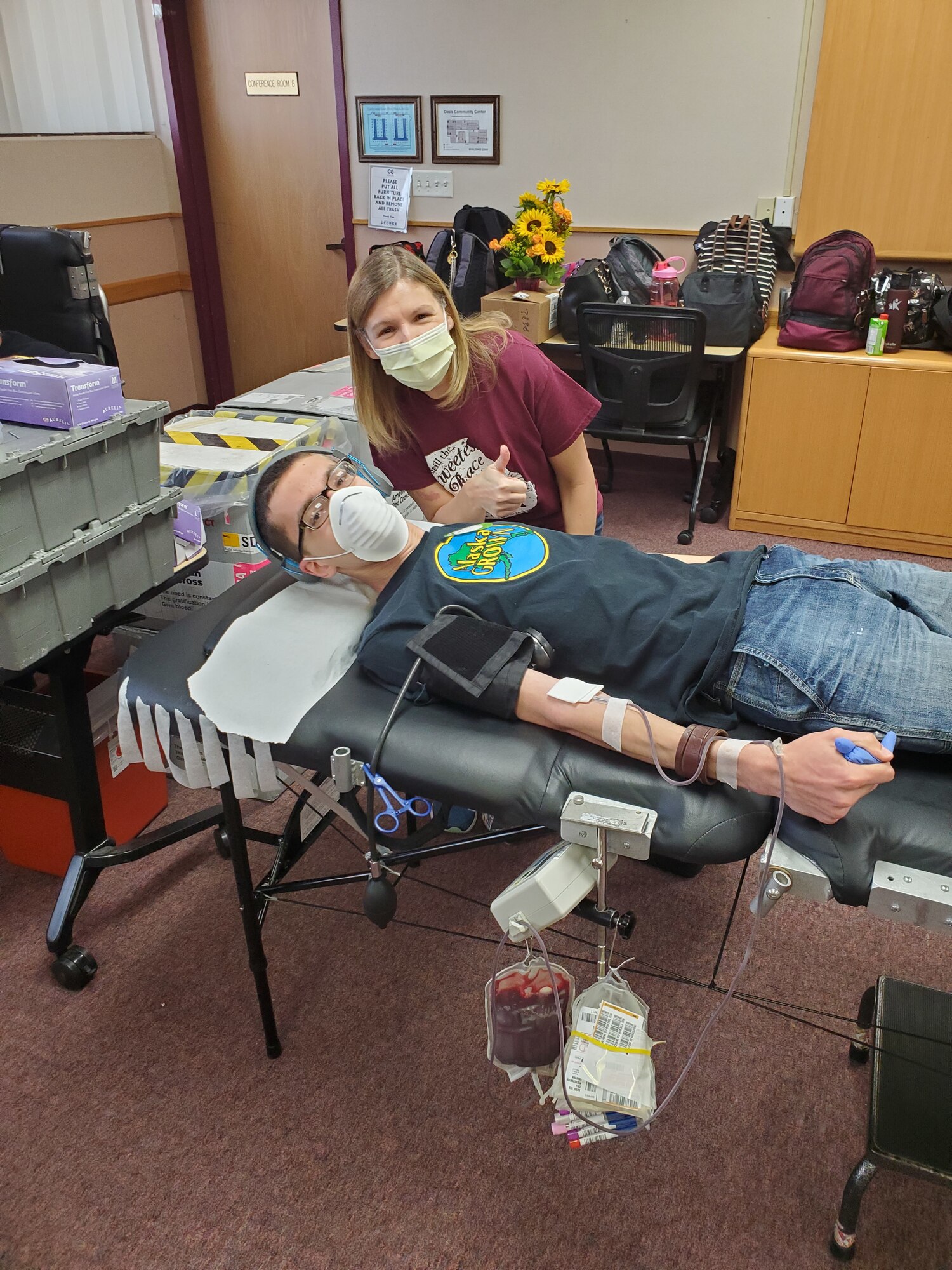 First-time donor William Dever, 17, and mother Joyce Dever pose for a photo during a Red Cross blood drive at Edwards Air Force Base, California, May 6. (Courtesy photo)