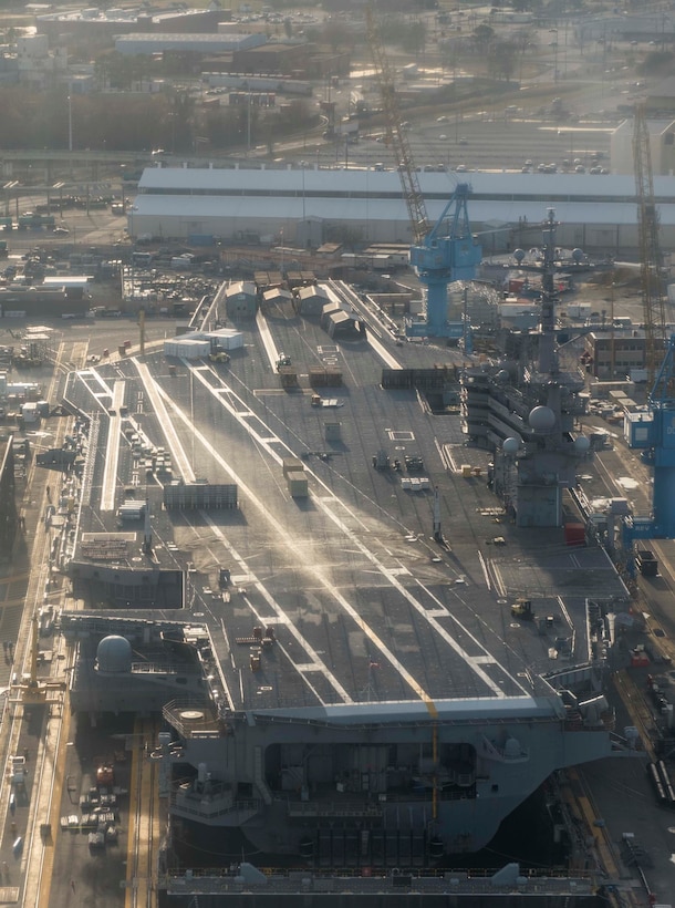 he aircraft carrier USS George H.W. Bush (CVN 77) sits in a dry dock, Feb. 26, 2019, at Norfolk Naval Shipyard (NNSY) in Portsmouth, Virginia during a docking planned incremental availability.