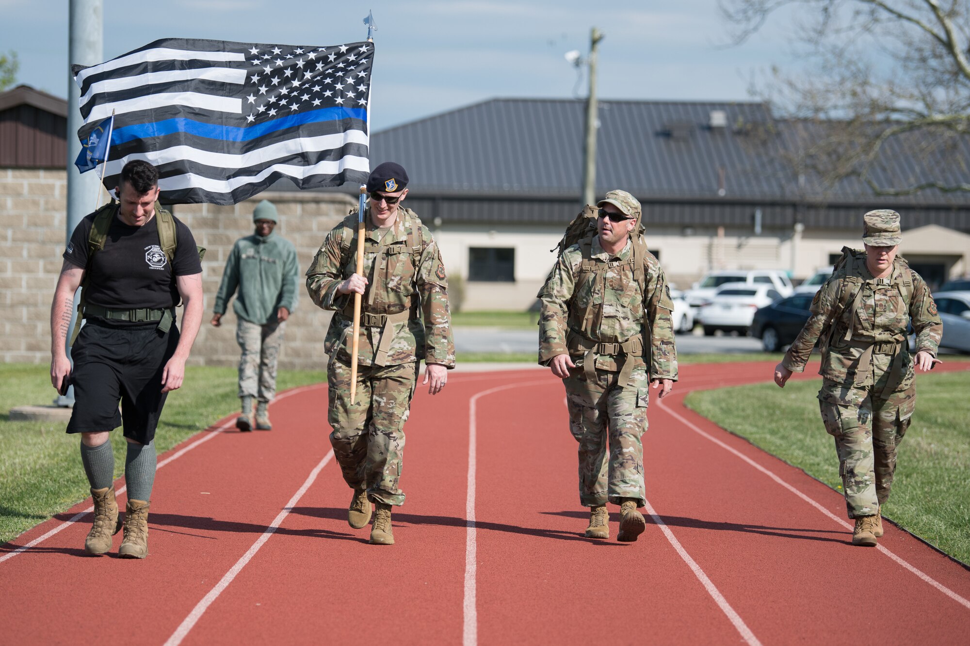 Members of Team Dover participate in the 2020 Police Week Ruck March May 14, 2020, at Dover Air Force Base, Delaware. Over 100 participants walked or ran in the 24-hour event commemorating fallen military and civilian law enforcement officers. (U.S. Air Force photo by Mauricio Campino)