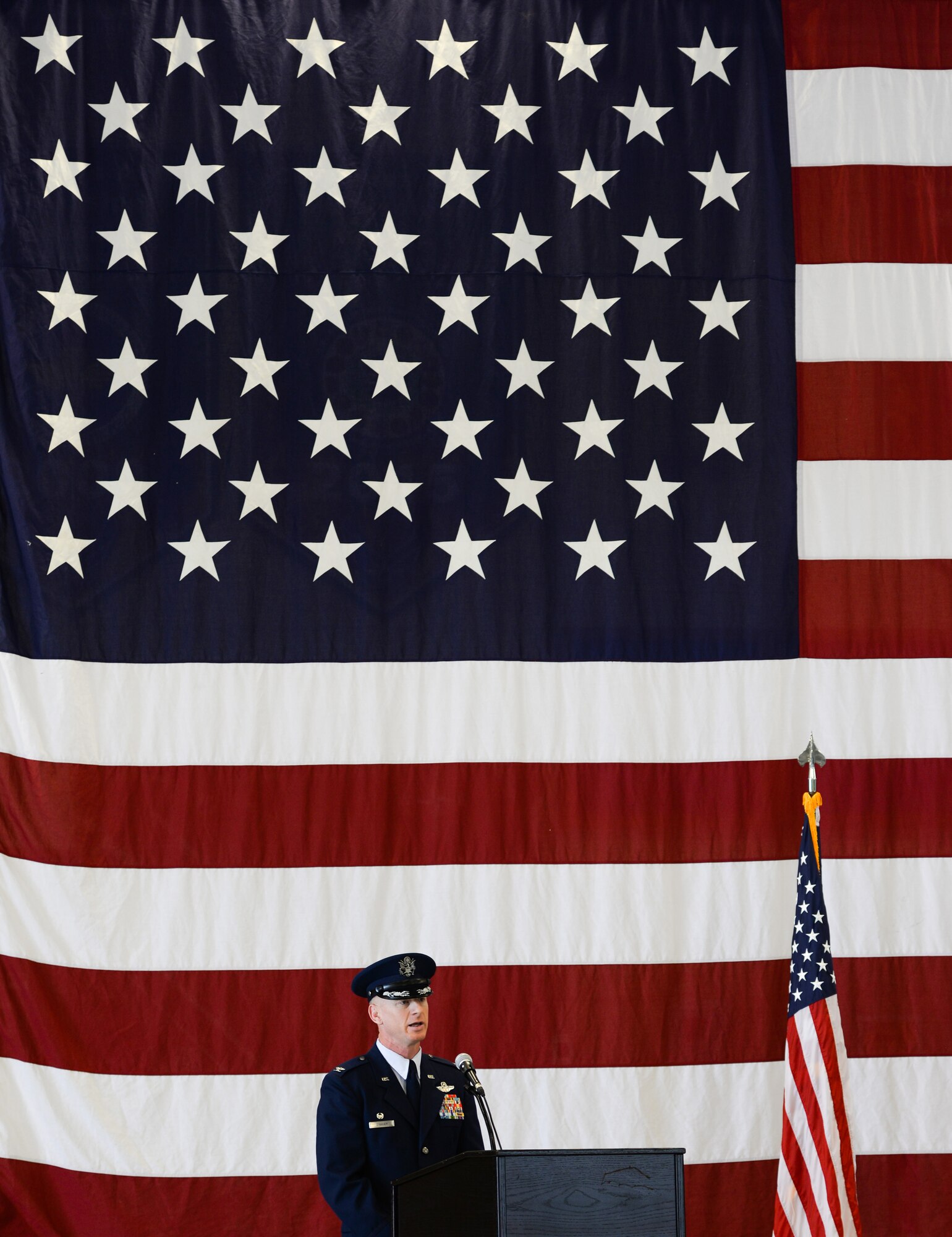 Col. Seth Graham, 14th Flying Training Wing commander, gives a speech during the wing’s change of command ceremony on May 18, 2020, at Columbus Air Force Base, Miss. Graham has more than 2,600 hours, including 741 combat hours. (U.S. Air Force photo by Airman 1st Class Davis Donaldson)