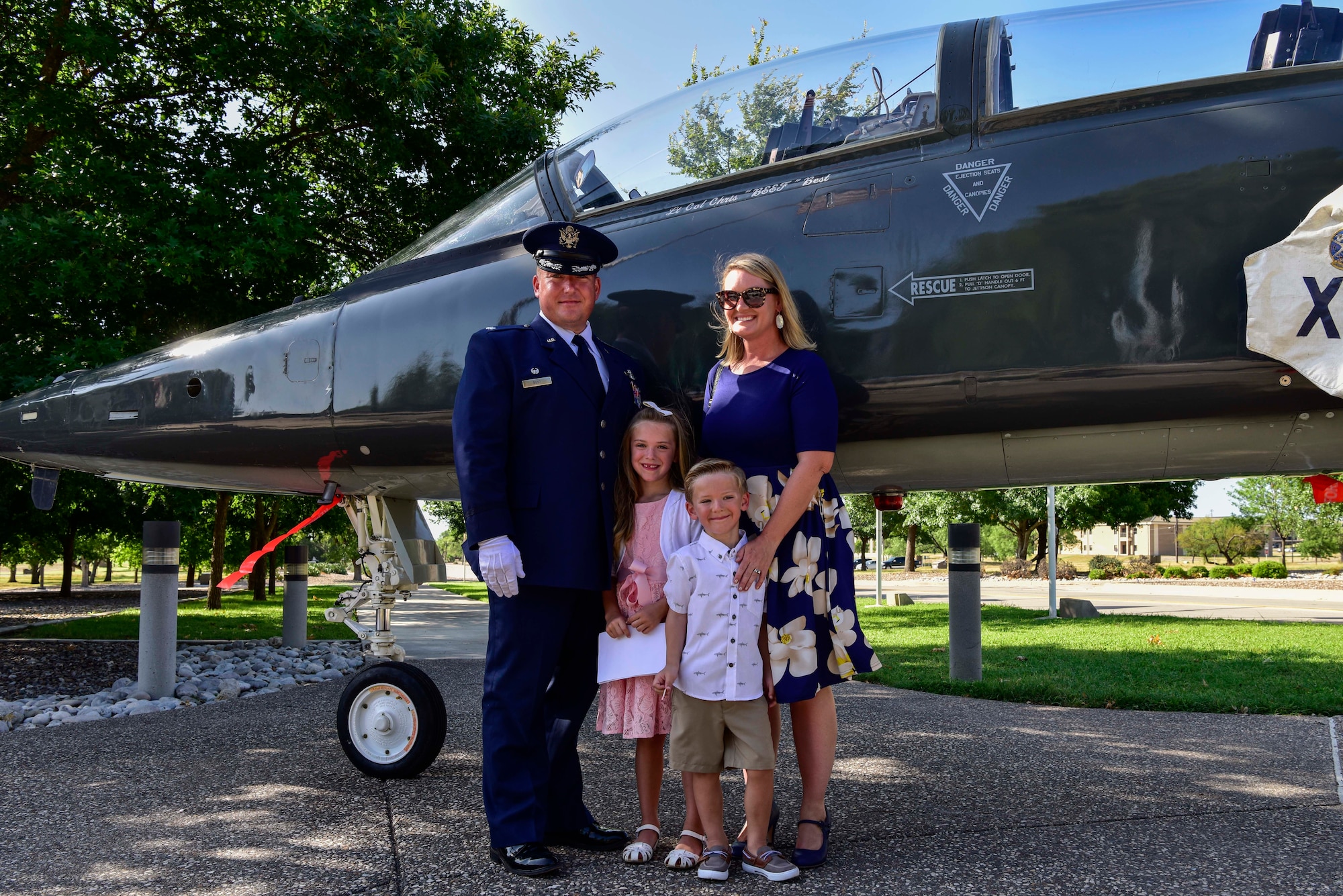 Lt. Col. Christopher Best, 47th Student Squadron commander, and his family pose for a picture in front of a T-38 Talon II at Laughlin Air Force Base, Texas, May 18, 2020. Best assumed command of the 47th Student Squadron after two years as commander of the 87th Flying Training Squadron. (U.S. Air Force photo by Senior Airman Marco A. Gomez)
