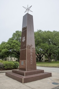A side angle picture of the Instructor Monument