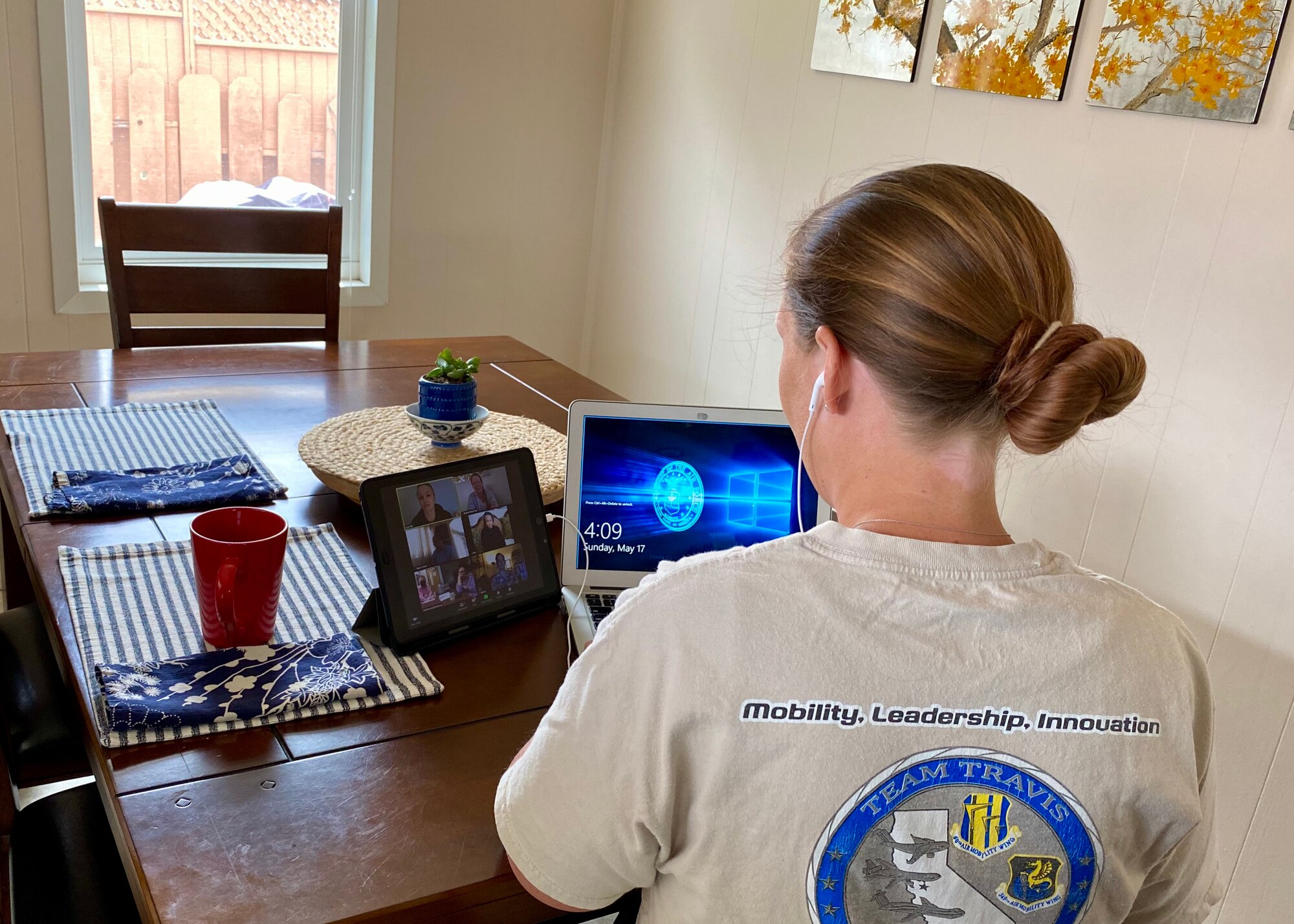 Senior Master Sgt. Rachel Martinez, 349th Air Mobility Wing public affairs specialist, attends a virtual meeting during the May drill weekend May 17, 2020, in Monterey, Calif. The 349th AMW held the May UTA virtually to safeguard Airmen from COVID-19.