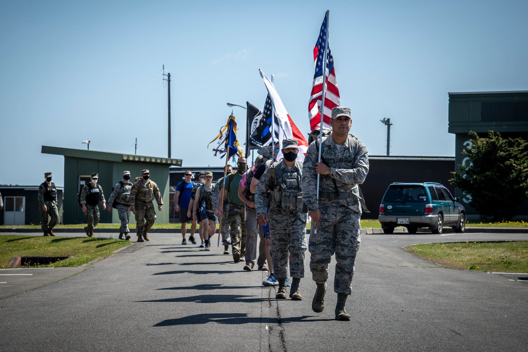 Misawa Air Base defenders participate in the 2020 Police Week 5K ruck march at Misawa AB, Japan, May 11, 2020. Security forces are responsible for protecting the U.S. Air Force’s most valuable assets–the lives of their fellow Airmen, aircraft and installations around the world. Police Week pays special recognition to those who lost their lives in the line of duty for the safety and protection of others. (U.S. Air Force photo by Airman 1st Class China M. Shock)
