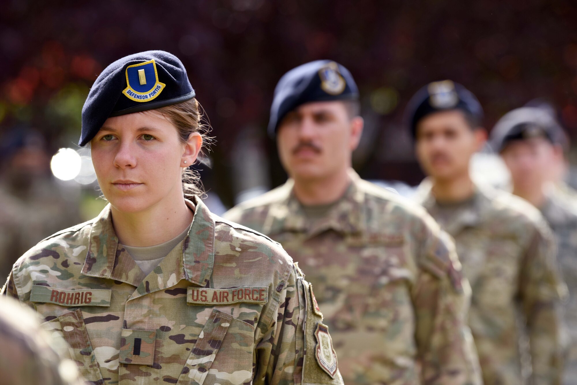 First Lieutenant Jessica Rohrig, 100th Security Forces Squadron operations officer, stands at attention during the 100th SFS Police Week closing ceremony at RAF Mildenhall, England, May 15, 2020. National Police Week is an observance in the United States which pays tribute to local, state and federal officers who’ve died or who’ve been disabled in the line of duty. (U.S. Air Force photo by Senior Airman Brandon Esau)