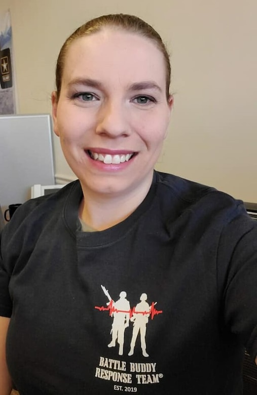 Soldier Sgt. Jamye Mort poses for a selfie wearing a black Army t-shirt.