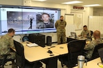 Texas National Guard Soldiers with Joint Task Force 176 – Col. Robert Crockem, commander; Maj. Peter Ammerman, operations officer; Capt. Brett Anderson, chaplain; and 1st Lt. Andrew Slack, liaison officer – honor Slack's brother, Spc. Wade Slack, on the 10th anniversary of his death at Camp Mabry in Austin, Texas, May 6, 2020.