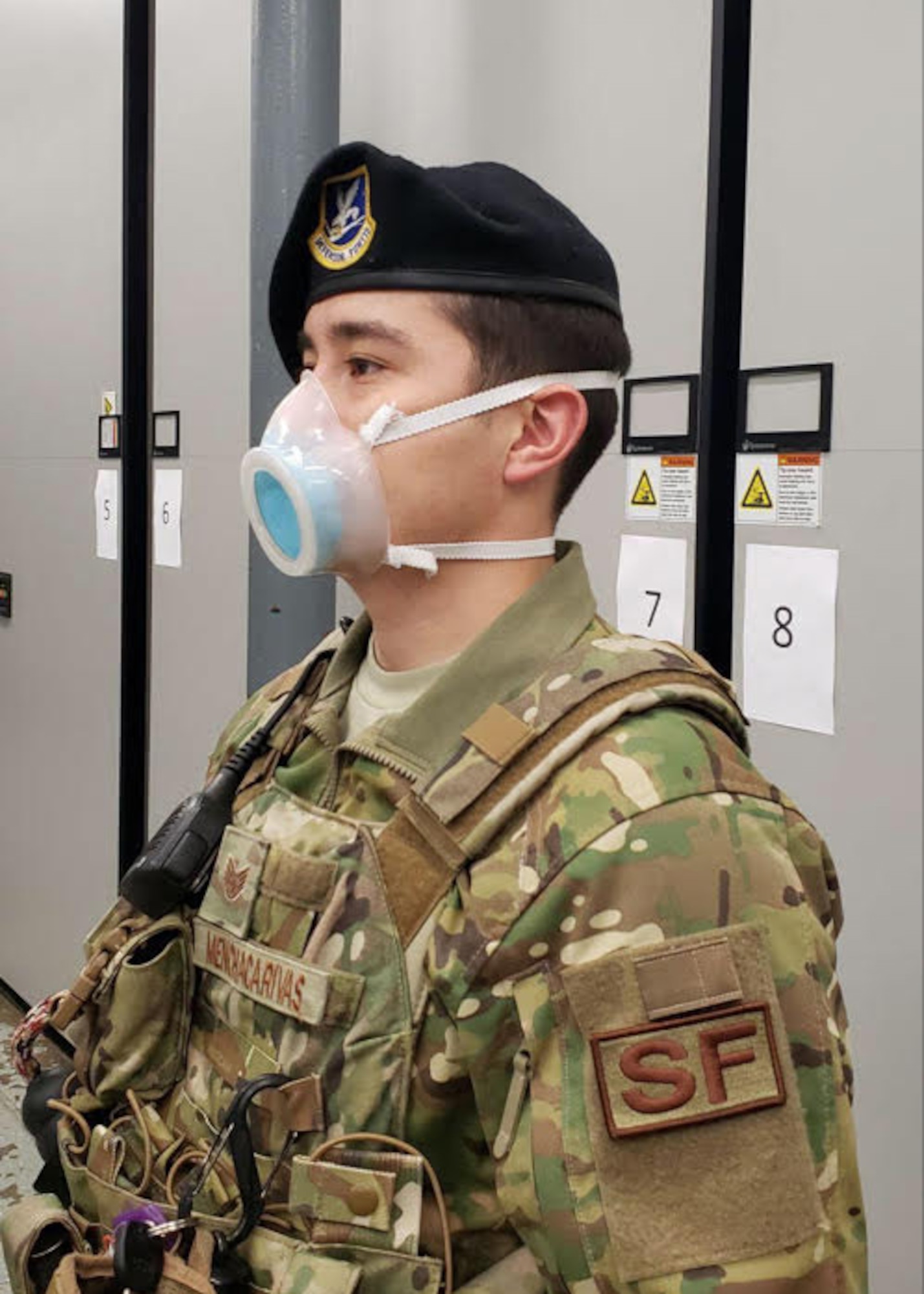 An 11th Security Support Squadron member wears a mask received through a pilot initiative called the Air Force Rapid Agile Manufacturing Platform at Joint Base Andrews, Md., May 15, 2020. The framework is designed to keep the Air Force supply system independent of the civilian medical market. (U.S. Air Force courtesy photo)