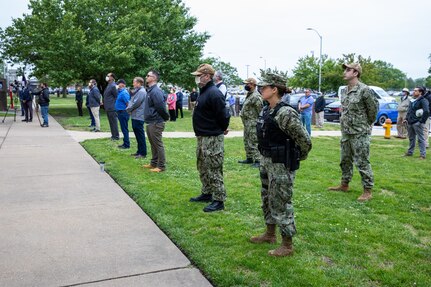 Norfolk Naval Shipyard employees and Sailors attend the Memorial Day Fall-In for Colors May 19 in remembrance of the service members who sacrificed their lives in service to the United States Armed Forces. In response to COVID-19, precautions were put in place to effectively social distance while still honoring those who are “Gone, But Never Forgotten.”