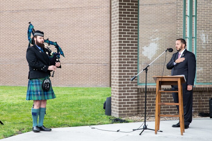 Norfolk Naval Shipyard’s Nuclear Engineering and Planning Department (Code 2340) Assistant Shift Test Engineer (ASTE) William Silke plays a rendition of Amazing Grace on the bagpipes at the Memorial Day Fall-In for Colors for the second year in a row – a skill he took up 14 years ago in honor and celebration of his uncle, New York Police Department Officer Stephen P. Driscoll who passed away Sept. 11, 2001.