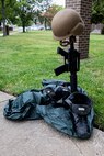 Norfolk Naval Shipyard’s (NNSY) Veteran Employee Readiness Group (VET-ERG) constructs a Battlefield Cross during the Memorial Day Fall-In for Colors May 19, made out of the personal effects of shipyard veterans to represent their fallen brothers and sisters.