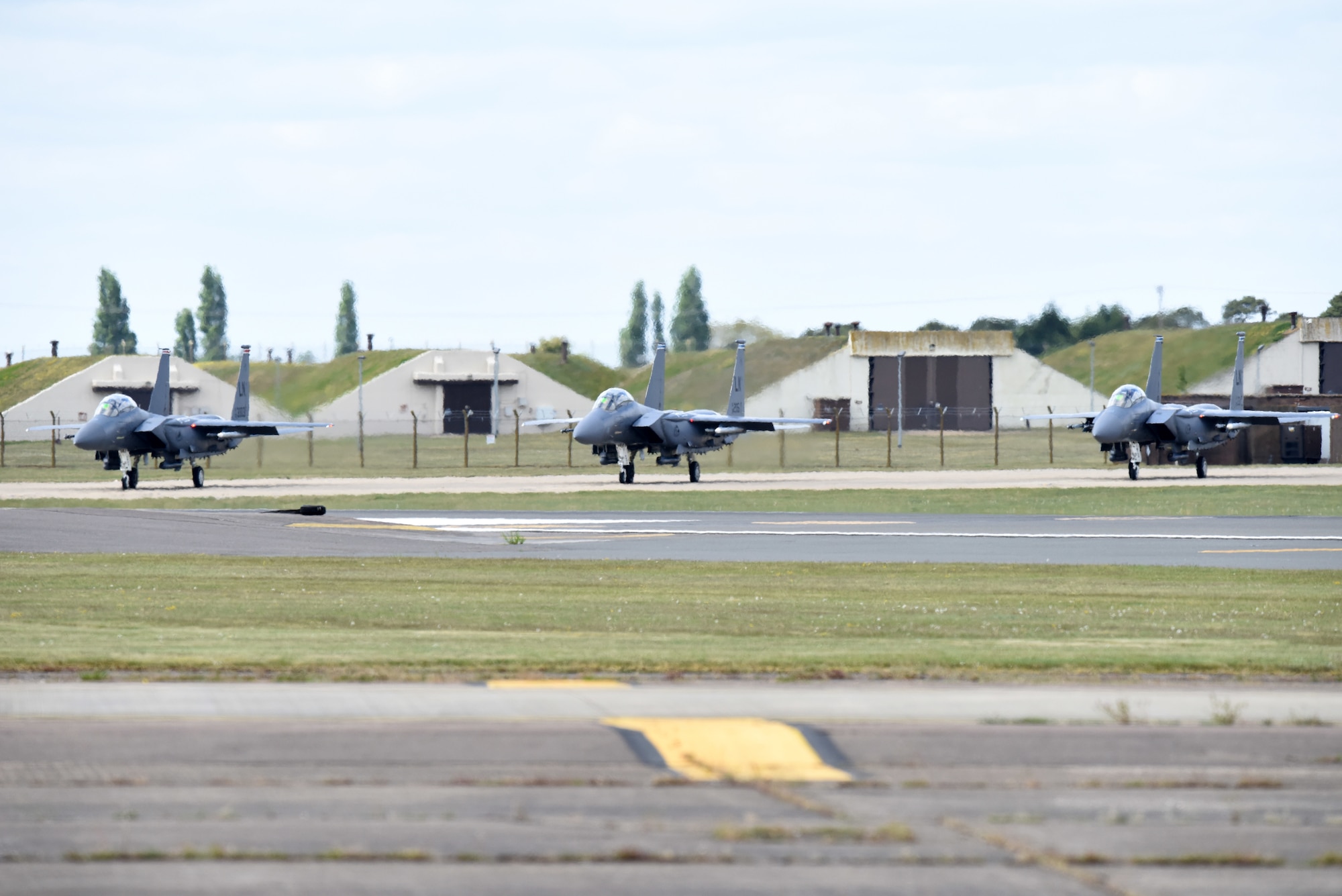An F-15E Strike Eagle assigned to the 494th Fighter Squadron takes off at Royal Air Force Lakenheath, England, May 14, 2020.  Despite the current COVID-19 crisis, the 48th Fighter Wing continues to maintain mission-readiness in order to safeguard U.S. national interests and those of our allies and partners. (U.S. Air Force photo by Airman 1st Class Rhonda Smith)