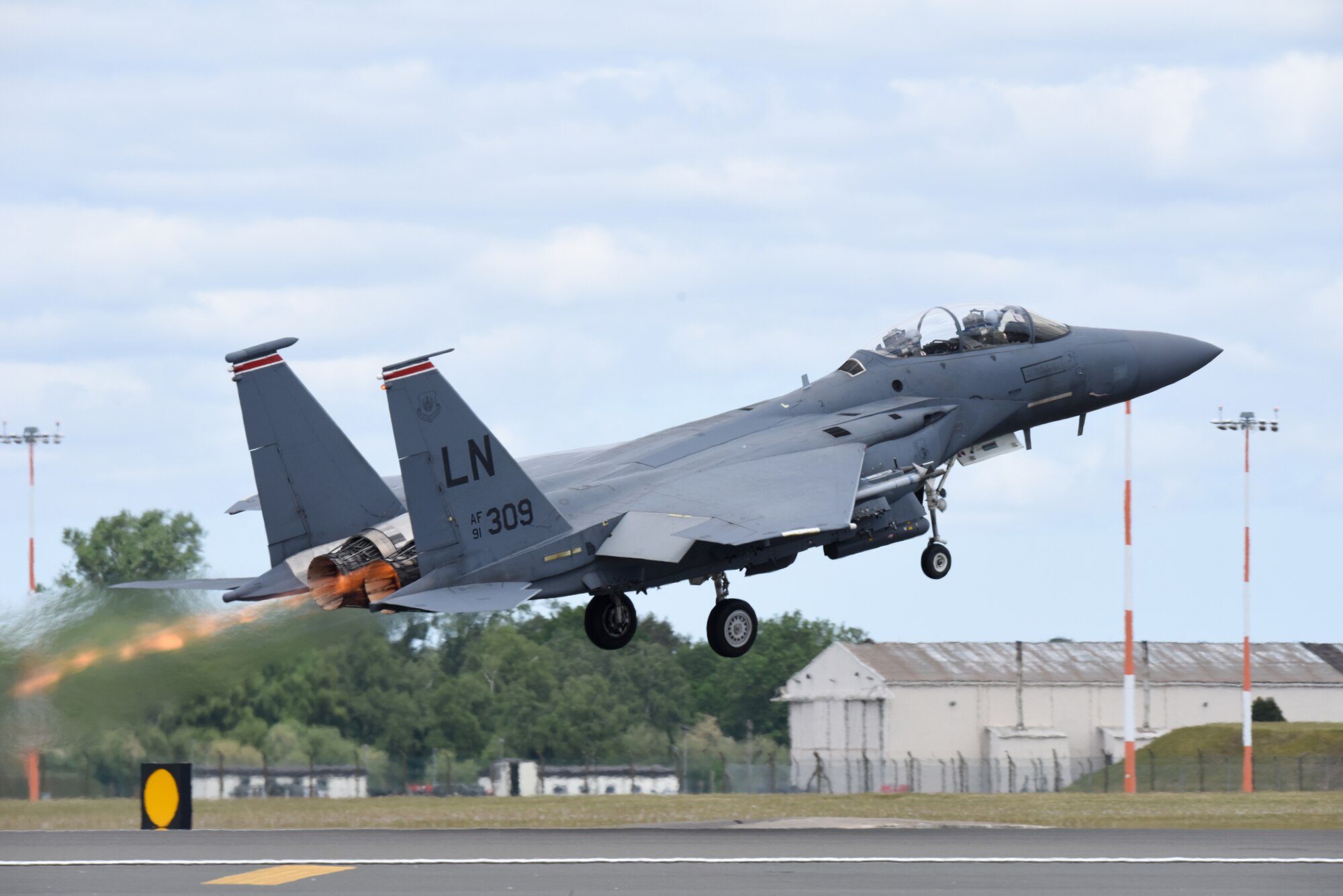 An F-15E Strike Eagle assigned to the 494th Fighter Squadron takes off at Royal Air Force Lakenheath, England, May 14, 2020. The F-15E Strike Eagle is a dual-role fighter designed to perform air-to-air and air-to-ground missions. (U.S. Air Force photo by Airman 1st Class Rhonda Smith)