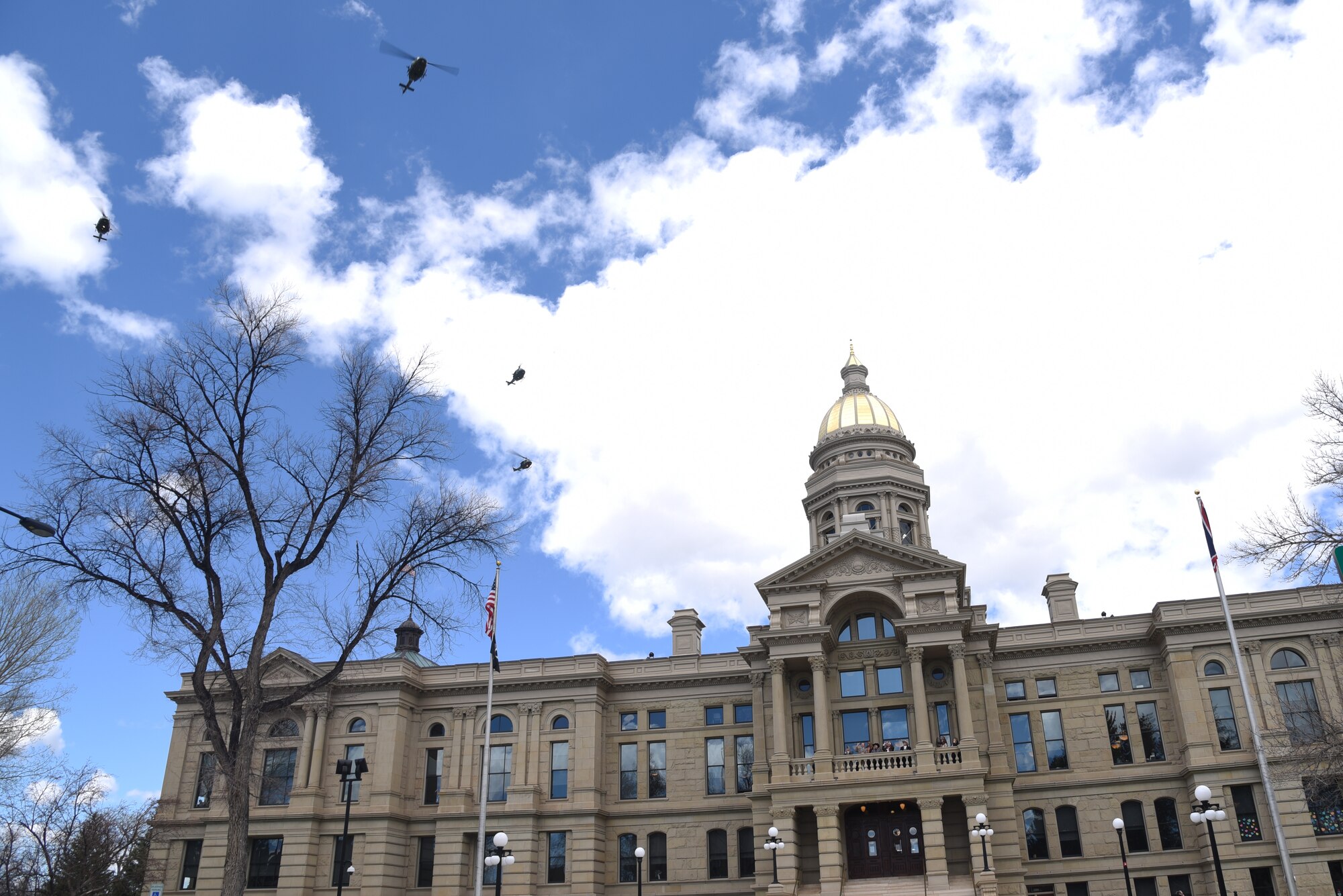 Hueys fly over state capitol