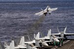 An F/A-18E Super Hornet, assigned to the "Sunliners" of Strike Fighter Squadron (VFA) 81, launches from the flight deck of the Nimitz-class aircraft carrier USS Harry S. Truman (CVN 75) in the Atlantic Ocean May 12, 2020. The Harry S. Truman Carrier Strike Group remains at sea in the Atlantic as a certified carrier strike group force ready for tasking in order to protect the crew from the risks posed by COVID-19, following their successful deployment to the U.S. 5th and 6th Fleet areas of operation. Keeping HSTCSG at sea in U.S. 2nd Fleet, in the sustainment phase of OFRP, allows the ship to maintain a high level of readiness during the global COVID-19 pandemic. (U.S. Navy photo by Mass Communication Specialist 2nd Class Tamara Vaughn)