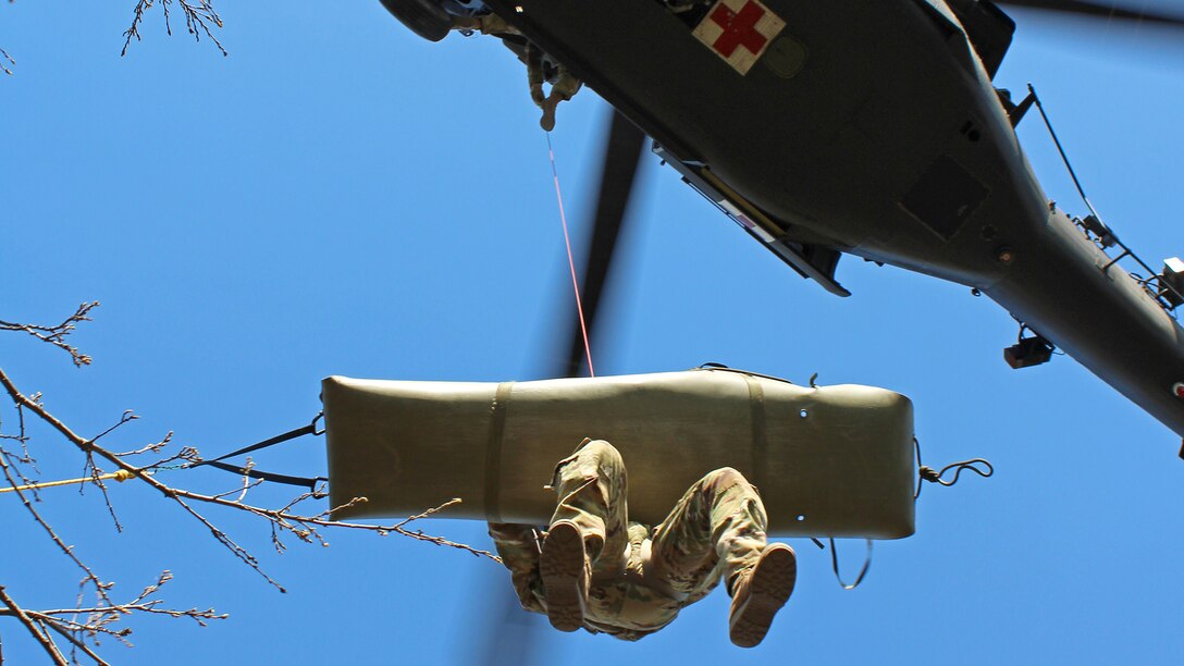 KFOR RC-E Dustoff conducts hoist training