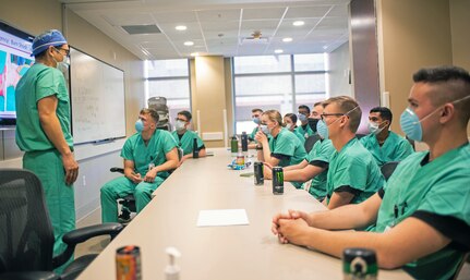 Lt. Col. Daniel Kim, a trauma surgeon at the U.S. Army Institute of Surgical Research Burn Center conducts training on burns and burn care to combat medic specialists temporarily assigned to the Burn Center.
