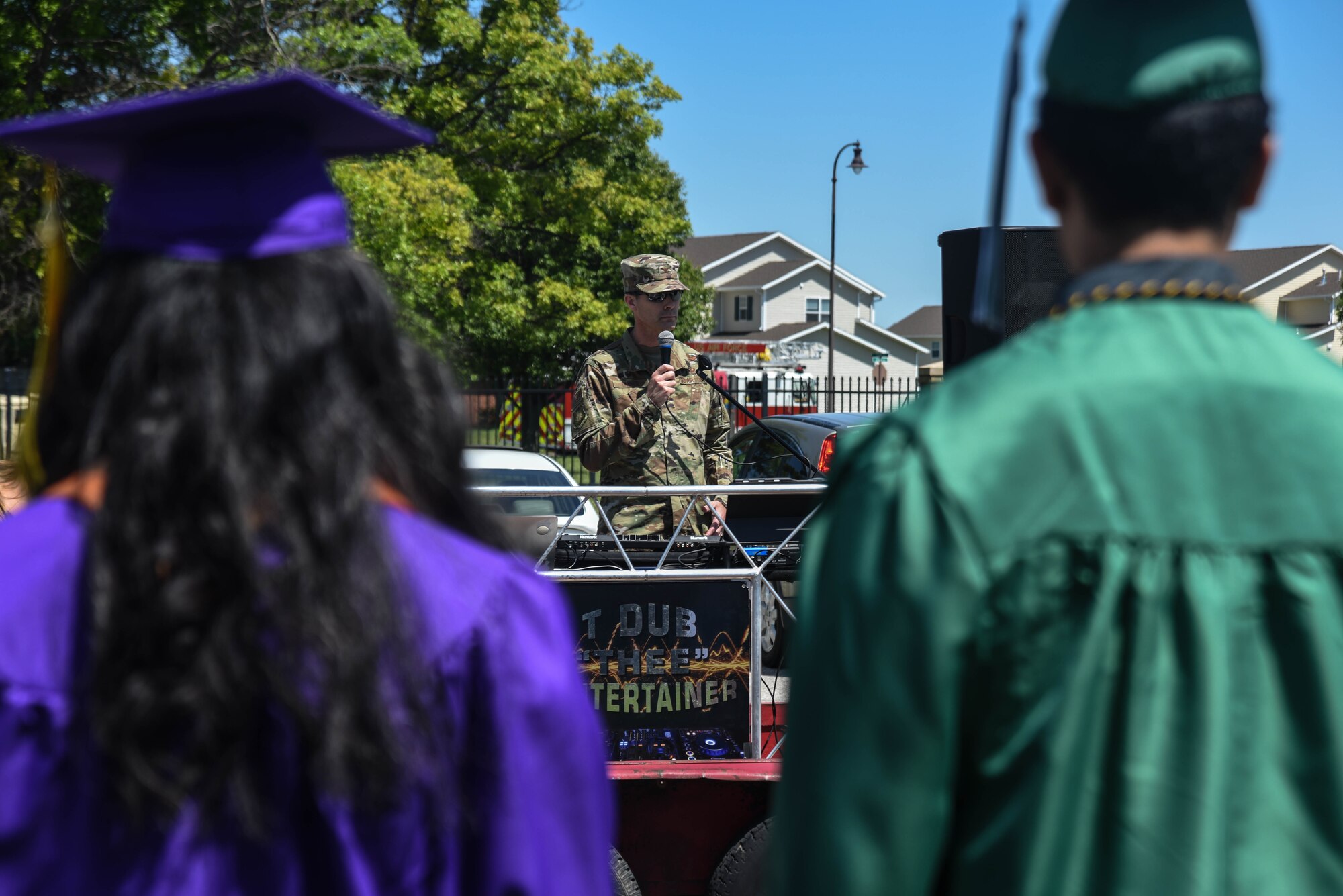 Col. Richard Tanner, 22nd Air Refueling Wing commander, speaks on the importance of cherishing the graduates’ memories and accomplishments before the parade May 18, 2020, at McConnell Air Force Base, Kansas. The parade included more than 14 families and celebrated 17 seniors graduating. (U.S. Air Force photo by Airman 1st Class Marc A. Garcia)