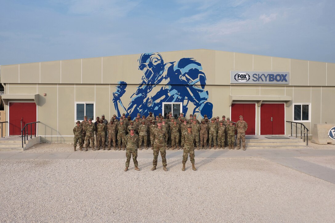 Members with the 379th Expeditionary Force Support Squadron pose for a photo Aug. 10, 2019, at Al Udeid Air Base, Qatar.
