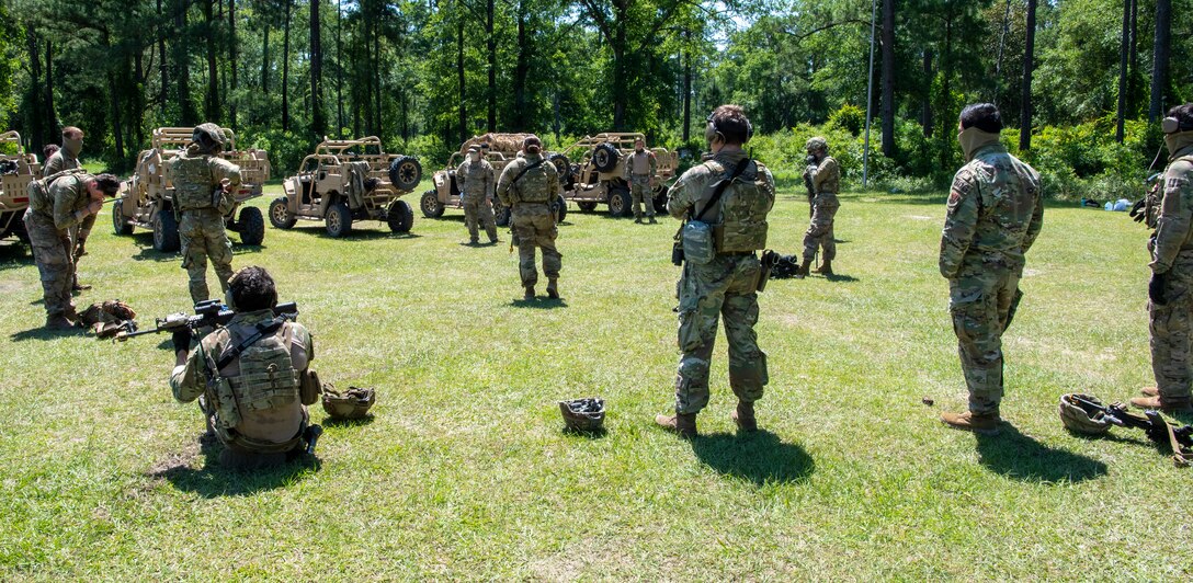 Airmen debrief after a training scenario