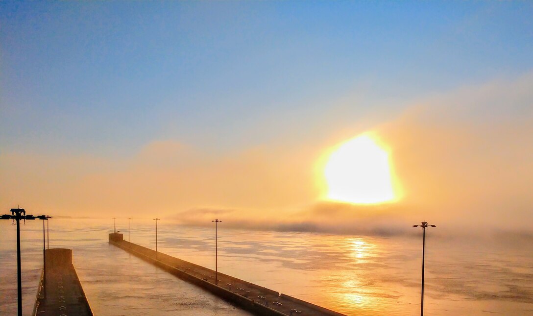 Foggy morning sunrise at Olmsted Locks and Dam