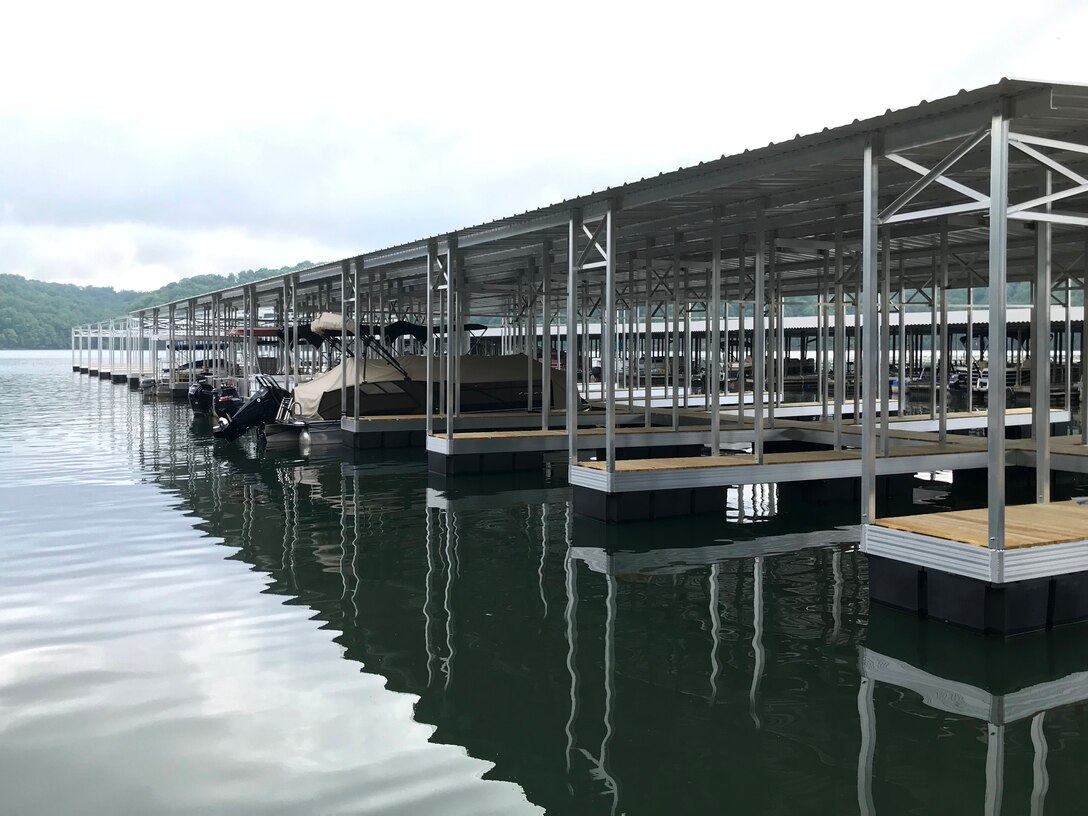Boats are docked in their slips May 19, 2020 at Cedar Hill Marina on the shoreline of Dale Hollow Lake in Celina, Tennessee. Marinas in the Cumberland River Basin, including at this location, were granted 90 days of rent abatement from the U.S. Army Corps of Engineers Nashville District during these times of uncertainty, which allows the marinas to utilize their on-hand cash to keep their businesses operational while sustaining impacts caused by COVID-19. (USACE photo by Sondra Carmen)