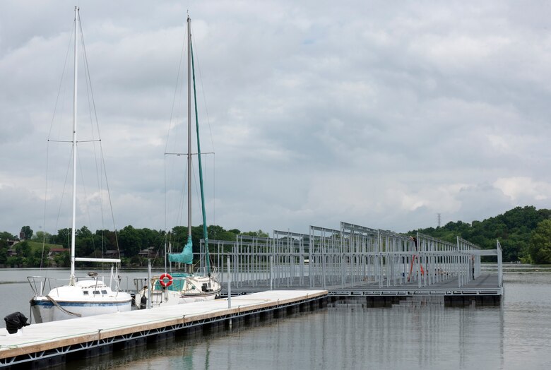 Crews work to construct 30 new slips May 19, 2020 at Cherokee Steakhouse, Marina and Campground on the shoreline of Old Hickory Lake in Lebanon, Tennessee. Marinas in the Cumberland River Basin, including at this location, were granted 90 days of rent abatement from the U.S. Army Corps of Engineers Nashville District during these times of uncertainty, which allows the marinas to utilize their on-hand cash to keep their businesses operational while sustaining impacts caused by COVID19. The marina had already invested in new upgrades when the pandemic affected business. (USACE photo by Lee Roberts)