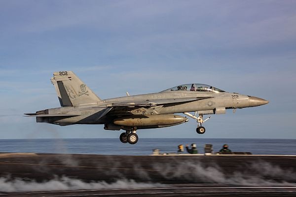 200118-N-MM912-1137PACIFIC OCEAN (Jan. 18, 2020) An F/A-18F Super Hornet attached to the "Jolly Rogers" of Strike Fighter Squadron (VFA) 103 launches from the flight deck of the aircraft carrier USS Abraham Lincoln (CVN 72) to return to Naval Air Station Oceana following a 10-month deployment. The Abraham Lincoln Carrier Strike Group is deployed to the U.S. 3rd Fleet area of operations. With Abraham Lincoln as the flagship, deployed strike group assets include staffs and aircraft of Carrier Strike Group 12 (CSG 12), Destroyer Squadron 2 (DESRON 2), and Carrier Air Wing 7 (CVW 7). (U.S. Navy photo by Mass Communication Specialist 3rd Class Michael Singley/Released)