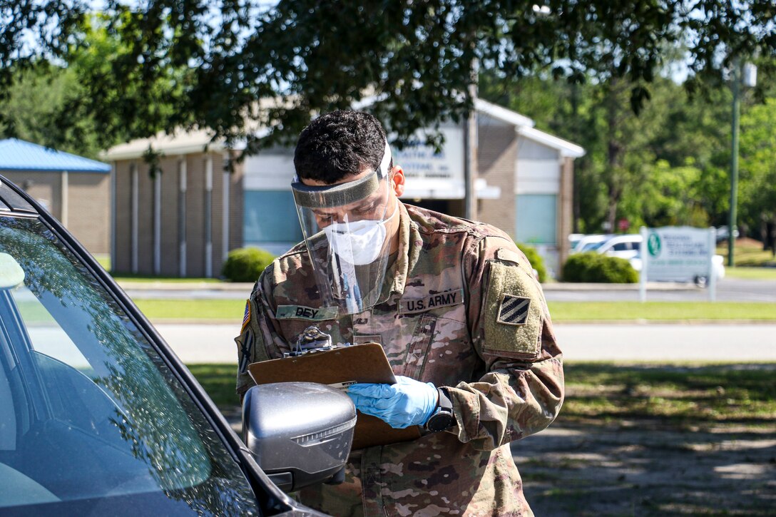 A guardsman collecting specimens.