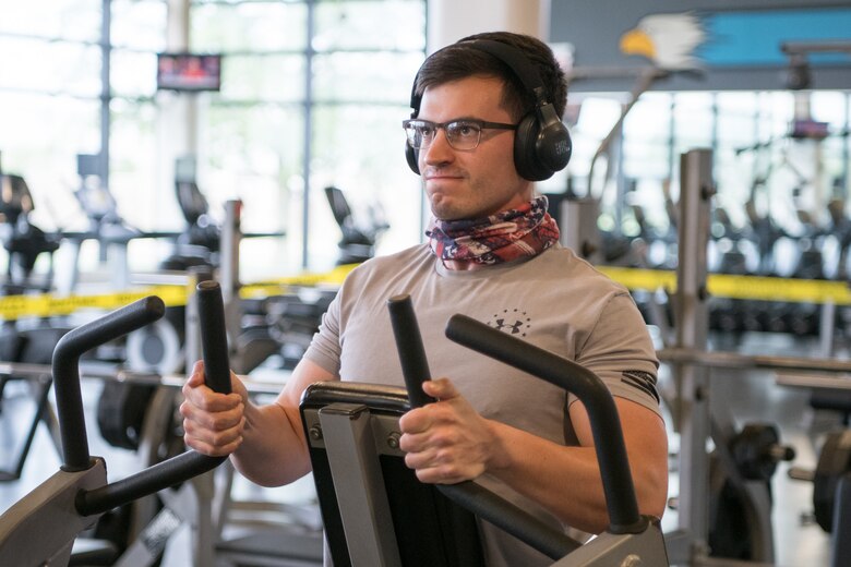 Airman 1st Class Joseph Latteri, 436th
Maintenance Squadron repair and reclamation
journeyman, finishes a set of seated rows at the
fitness center, May 20, 2020,at Dover Air Force
Base, Delaware. Although masks are required
when transitioning from one workout station to
the next, patrons can remove masks while
exercising. (U.S. Air Force photo by Mauricio Campino)