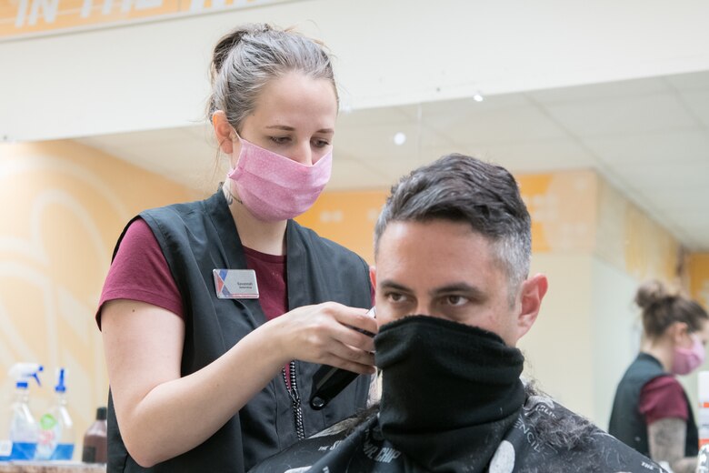 Capt. Ricardo Morales, 3rd Airlift Squadron C-17
Globemaster III pilot, gets a haircut at the Base
Exchange barbershop, May 20, 2020, at Dover Air
Force Base, Delaware. As part of the base’s Phase
I reopening, the barbershop officially reopened
on May 19 for appointments solely with military
members.(U.S. Air Force photo by Mauricio Campino)