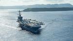 PHILIPPINE SEA (May 21, 2020) The aircraft carrier USS Theodore Roosevelt (CVN 71) operates in the Philippine Sea May 21, 2020, following an extended visit to Guam in the midst of the COVID-19 global pandemic. Theodore Roosevelt is underway conducting carrier qualifications during a deployment to the Indo-Pacific.
