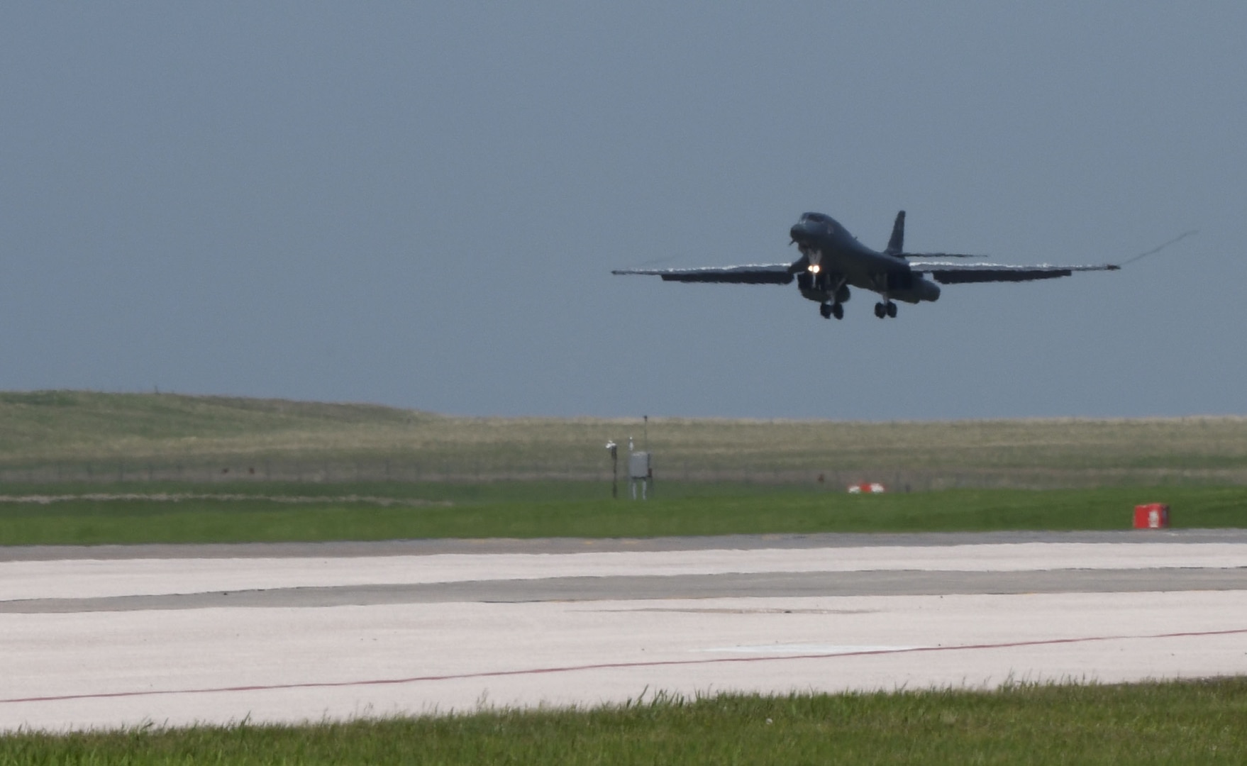 A 34th Bomb Squadron B-1B Lancer lands at Ellsworth Air Force Base, S.D., May 20, 2020, following their support of a Bomber Task Force mission to the U.S. European Command area of responsibility. These long-range, long-duration B-1 missions demonstrate the U.S. Air Force’s global strike capacity and ability to deliver precision-guided ordnance against any adversary - anytime, anywhere. (U.S. Air Force photo by Airman 1st Class Christina Bennett)