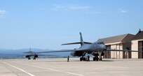 Two B-1B Lancers assigned to the 34th Bomb Squadron taxi in to the apron on the flight line at Ellsworth Air Force Base, S.D., May 20, 2020.  The two bombers completed a long-range, long-duration Bomber Task Force mission within the U.S. European Command area of responsibility. BTF missions are representative of the U.S. commitment to integrate with NATO and allied partners to ensure regional security. (U.S. Air Force photo by Airman 1st Class Christina Bennett)