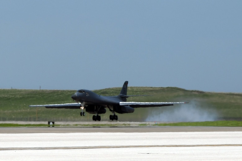 A 34th Bomb Squadron B-1B Lancer lands on the runway at Ellsworth Air Force Base, S.D., May 20, 2020, after the completion of a long-range, long-duration Bomber Task Force mission within the U.S. European Command area of responsibility. BTF missions provide opportunities to work and train with U.S. allies and partners, while strengthening capabilities by familiarizing aircrew with air bases and operations in different parts of the world. (U.S. Air Force photo by Airman 1st Class Christina Bennett)