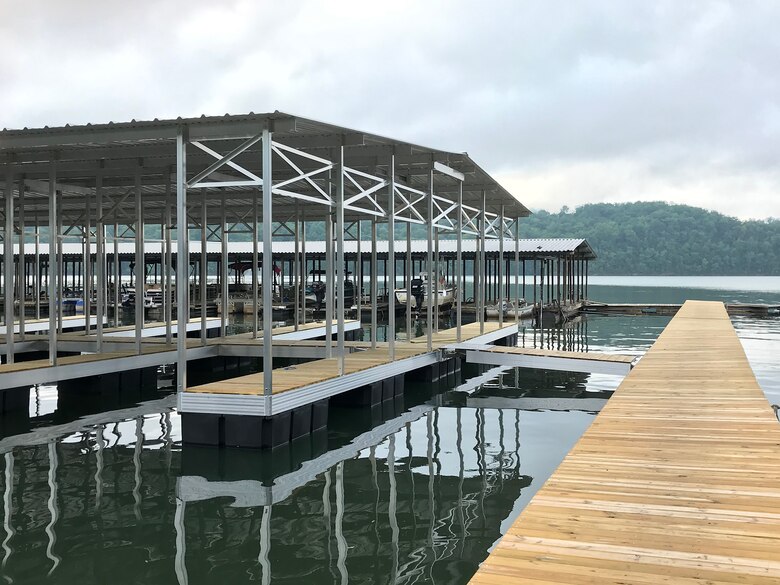 Boats are docked in their slips May 19, 2020 at Cedar Hill Marina on the shoreline of Dale Hollow Lake in Celina, Tennessee. Marinas in the Cumberland River Basin, including at this location, were granted 90 days of rent abatement from the U.S. Army Corps of Engineers Nashville District during these times of uncertainty, which allows the marinas to utilize their on-hand cash to keep their businesses operational while sustaining impacts caused by COVID-19. (USACE photo by Sondra Carmen)