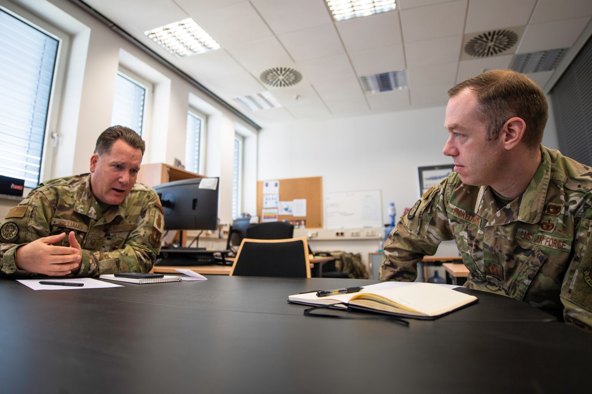 Photo of air advisors attending a video conference
