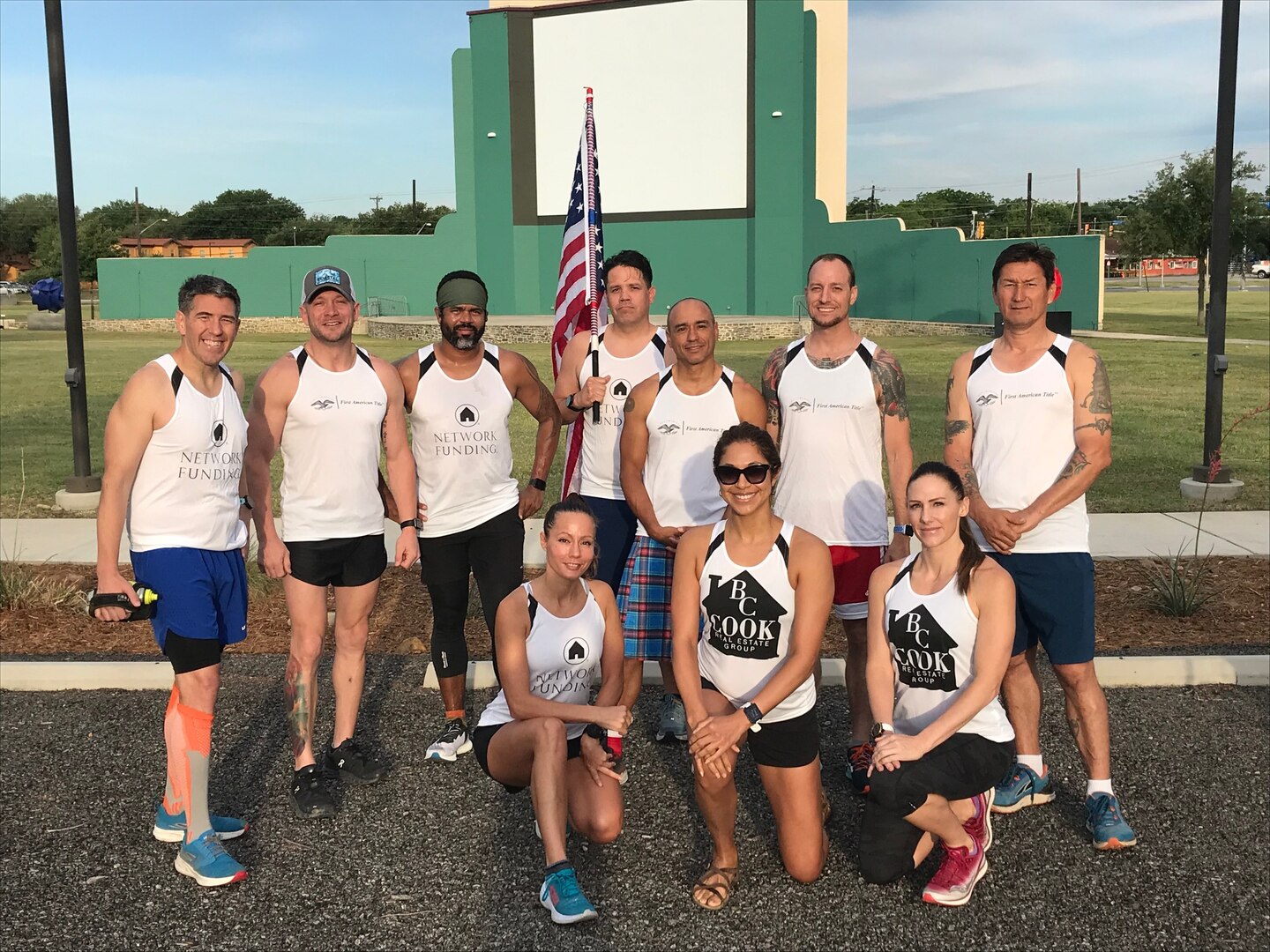 Sgt. 1st Class Maité Bengoa (kneeling in blue running shoes), the enlisted advisor to the deputy commander of health readiness at Brooke Army Medical Center, and the members of her team, called “Don’t Get in a Van with Strangers,” pose before a practice run.