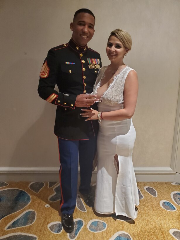 Staff Sgt. Adalberto Dominguez, the staff noncommissioned officer-in-charge of Marine Recruiting Station Miami, and his wife, Ashley Dominguez, pose for a photo during Marine Corps Recruiting Stations Fort Lauderdale’s 244th Marine Corps Birthday Ball celebration Nov. 9, 2019. (Courtesy photo by Staff Sgt. Adalberto Dominguez)