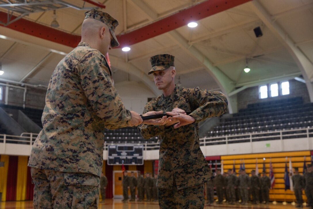 U.S. Marine Corps 1st Sgt. Joshua Pendley, 8th Engineer Support Battalion, 2nd Marine Logistics Group, reports in during a relief and appointment ceremony at Camp Lejeune, N.C., Jan. 31, 2020. Sgt. Maj. Roger Baez was relieved as the 8th Engineer Support Battalion sergeant major and Sgt. Maj. Patrick Fay was appointed. The ceremony symbolizes the passing of trust and confidence from the outgoing sergeant major to the incoming sergeant major.