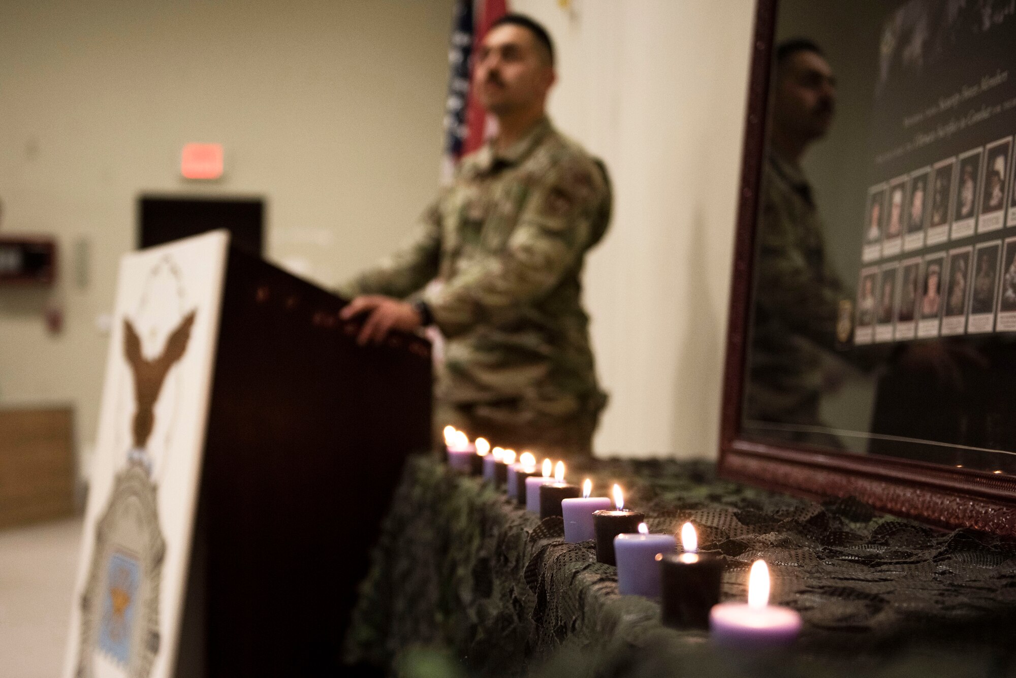Candles flicker before a memorial for fallen security forces Airmen during a Final Guard Mount ceremony May 15, 2020, at Incirlik Air Base, Turkey. The 39th Security Forces Squadron conducted the ceremony at the end of National Police Week to honor the memory of Air Force law enforcers who have paid the ultimate sacrifice. (U.S. Air Force photo by Staff Sgt. Joshua Magbanua)