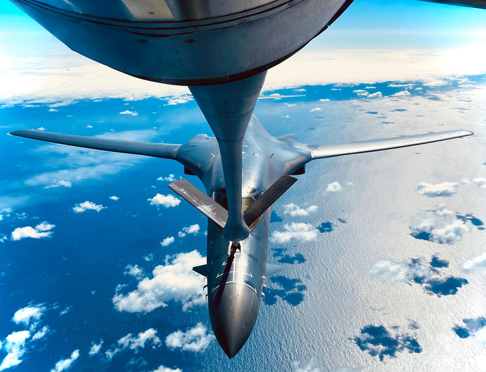A B-1B Lancer from the 28th Bomb Wing, Ellsworth Air Force Base, South Dakota, receives fuel from a KC-135 Stratotanker from the 100th Air Refueling Wing, RAF Mildenhall, England, during a training mission for Bomber Task Force Europe over England, May 11, 2020. Bomber Task Force missions are intended to demonstrate U.S. commitment to the collective defense of the NATO alliance and are a visible demonstration of the U.S. capability of extended deterrence. (U.S. Air Force photo by Staff Sgt. Kelly O’Connor)