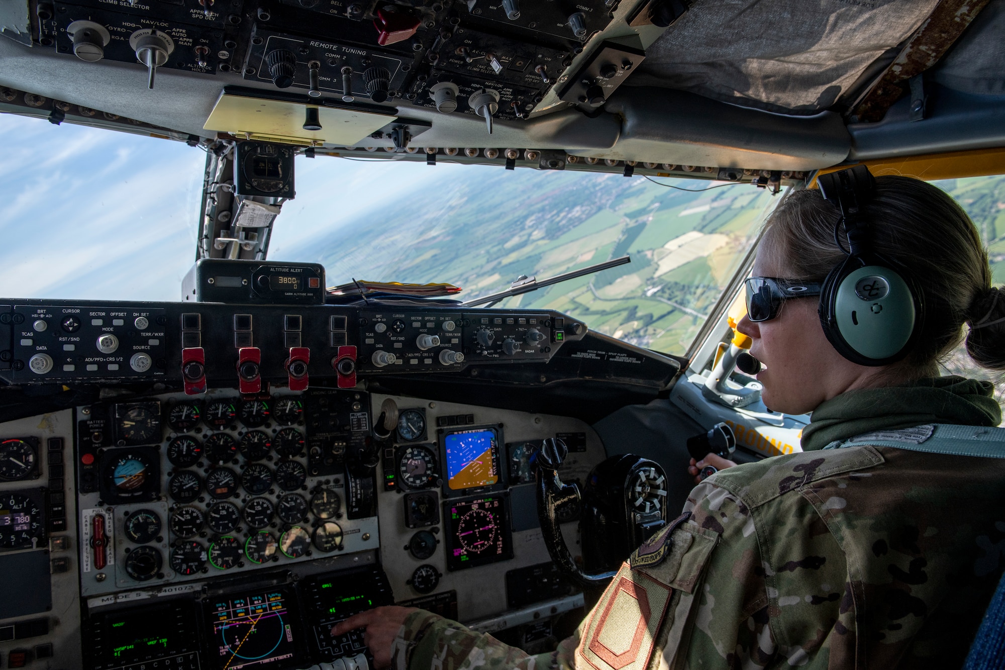 Captain Megan Bowman, 351st Air Refueling Squadron pilot, flies a KC-135 Stratotanker over England after supporting a Bomber Task Force Europe mission, April 23, 2020. The mission marked the first time B-1s have flown over Sweden to integrate with Swedish Gripens while conducting close-air support training with Swedish Joint Terminal Attack Controller ground teams at Vidsel Range. (U.S. Air Force photo by Tech. Sgt. Emerson Nuñez)