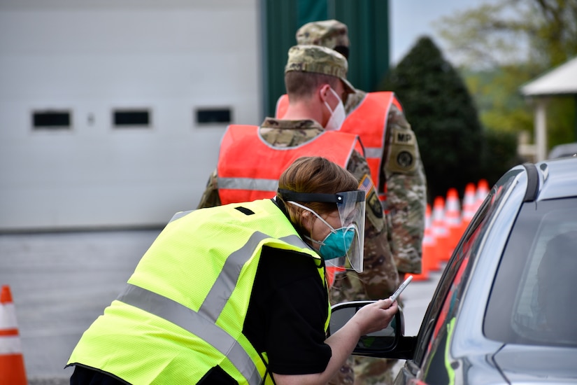 Volunteers working at a COVID-19 testing site.