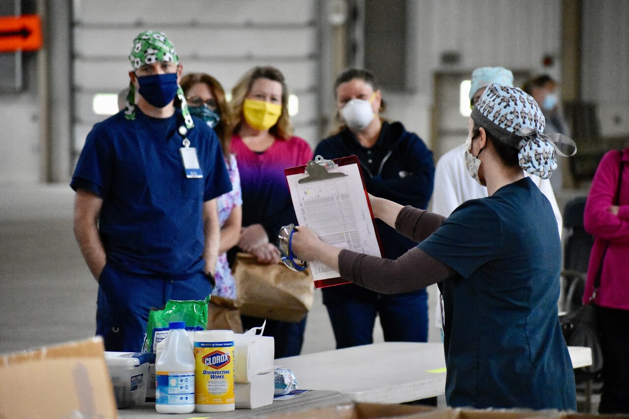 Volunteers working at a COVID-19 testing site.