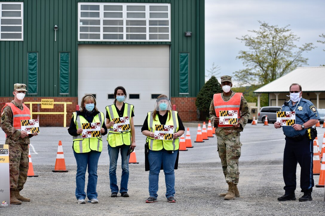 Volunteers working at a COVID-19 testing site.