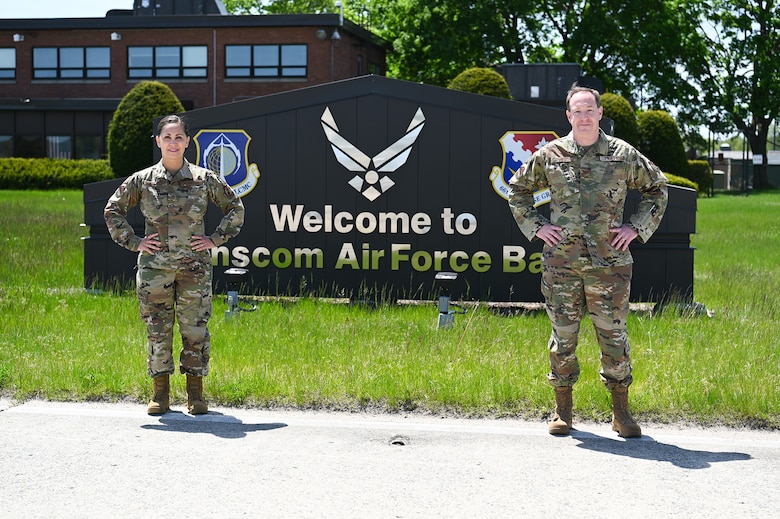 Col. Mark Wilson and Master Sgt. Teresa Baker-Opland, Individual Mobilization Augmentees to the 66th Air Base Group commander and Inspector General Office superintendent, pose for a photo on the flight line at Hanscom Air Force Base, Mass., May 19. Both reserve citizen Airmen were activated to serve on Hanscom’s COVID-19 task force in March of this year. (U.S. Air Force photo by Todd Maki)