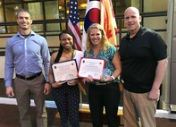 U.S. Army Pfc. Bless Pantlitz, center left, a member of the 563rd Medical Logistics Company, and Rachael Welde, center right, are pictured with USAG-Daegu Commander Col. Ed Ballanco and Command Sgt. Maj. Alan Cline on May 14 at Camp Walker's Evergreen Club. Pantlitz was recently recognized as USAG-Daegu's Active Duty Service Member of the Year and Welde was named the overall USFK Area IV and USAG-Daegu Volunteer of the Year, along with the President’s Volunteer Service Award.